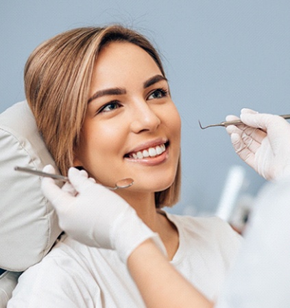 A young female undergoing a dental checkup in Richmond