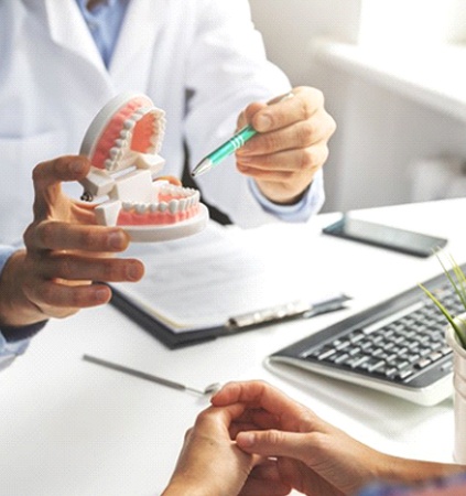 patient at a consultation for dentures in Richmond, VA