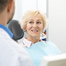 patient smiling during consultation 