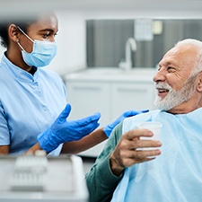 patient learning about additional tooth replacement options 