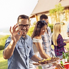 Man smiling about the benefits of dental implants in Richmond