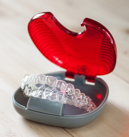 Set of Invisalign trays in carrying case