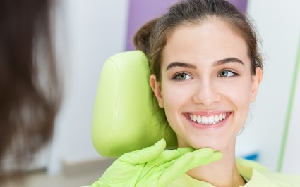 Woman smiling during cosmetic dentistry consultation