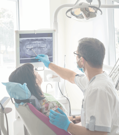 Dentist showing a patient their dental x rays