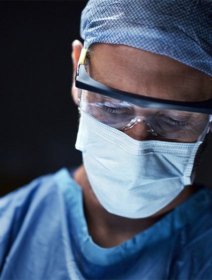 Dentist working on patient during dental school