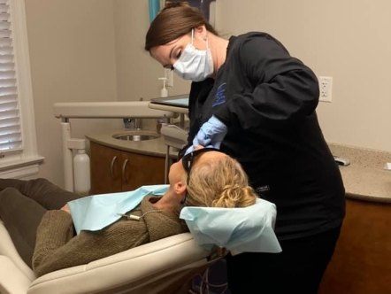 Richmond dental team member treating dental patient