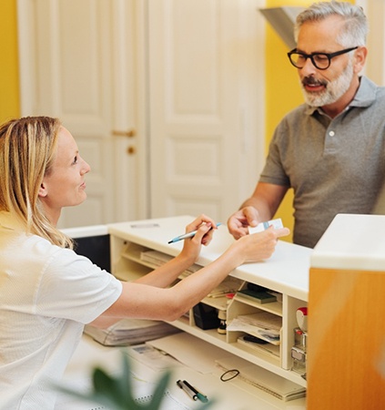 patient paying for dental bills