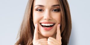 a closeup of a patient’s smiling face