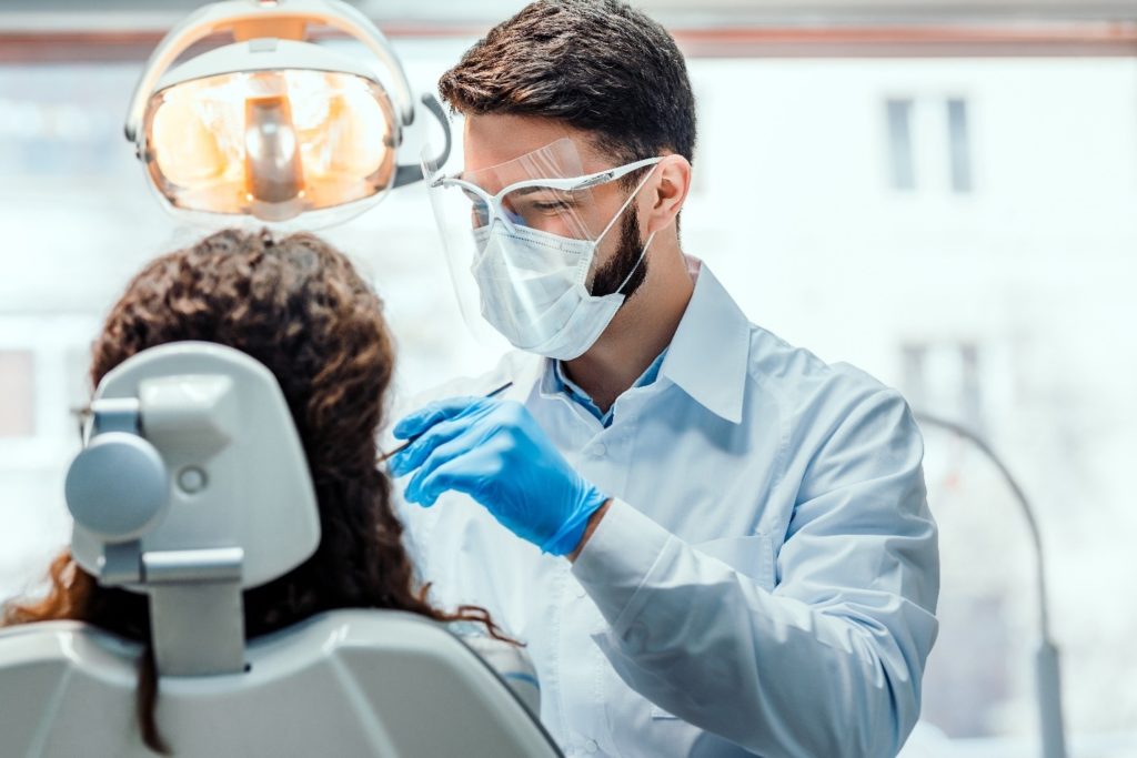 Patient undergoing dental implant treatment