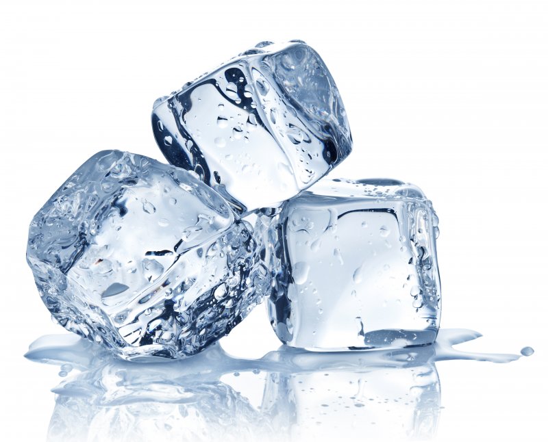 3 ice cubes, slightly melting on white background