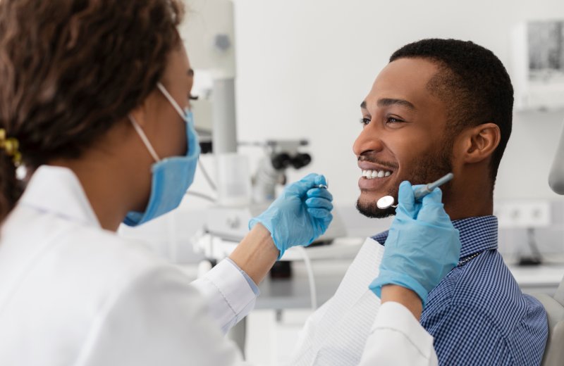 Patient smiling at the dentist after cosmetic dentistry